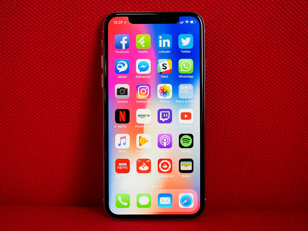 Apple iPhone X front displaying apps