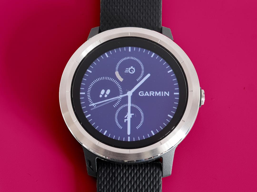 Garmin Vivoactive 3 watch face close up with clock on-screen