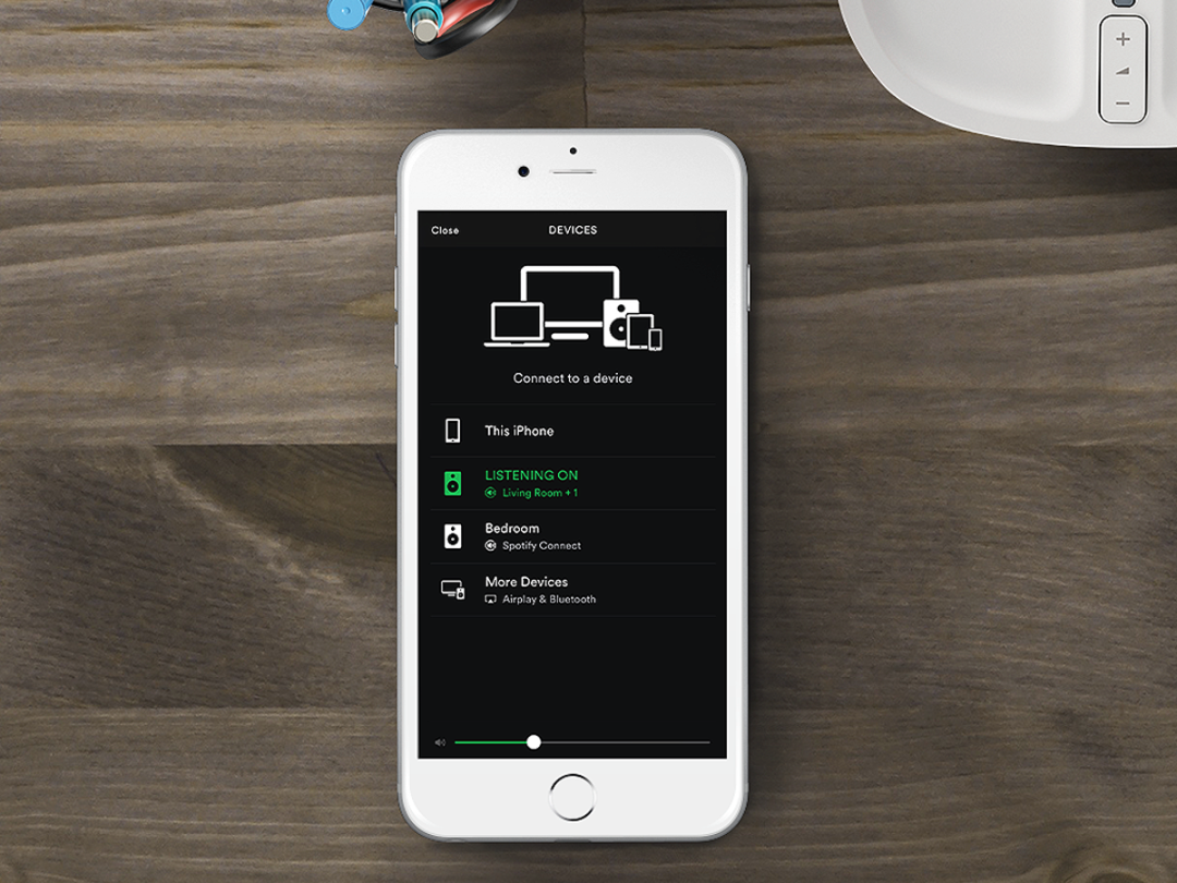Where in the sonos app can I see the name of the spotify playlist that is playing?