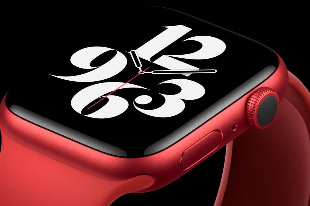 A red Apple Watch against a black background