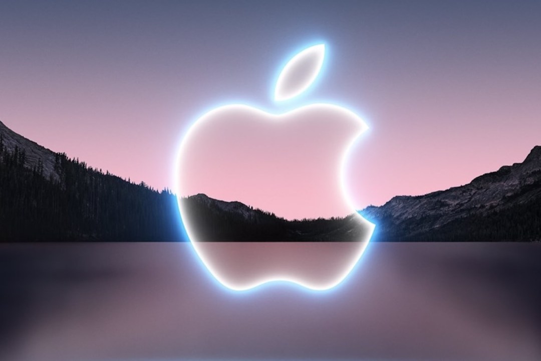 An Apple logo against a render of a scenic background