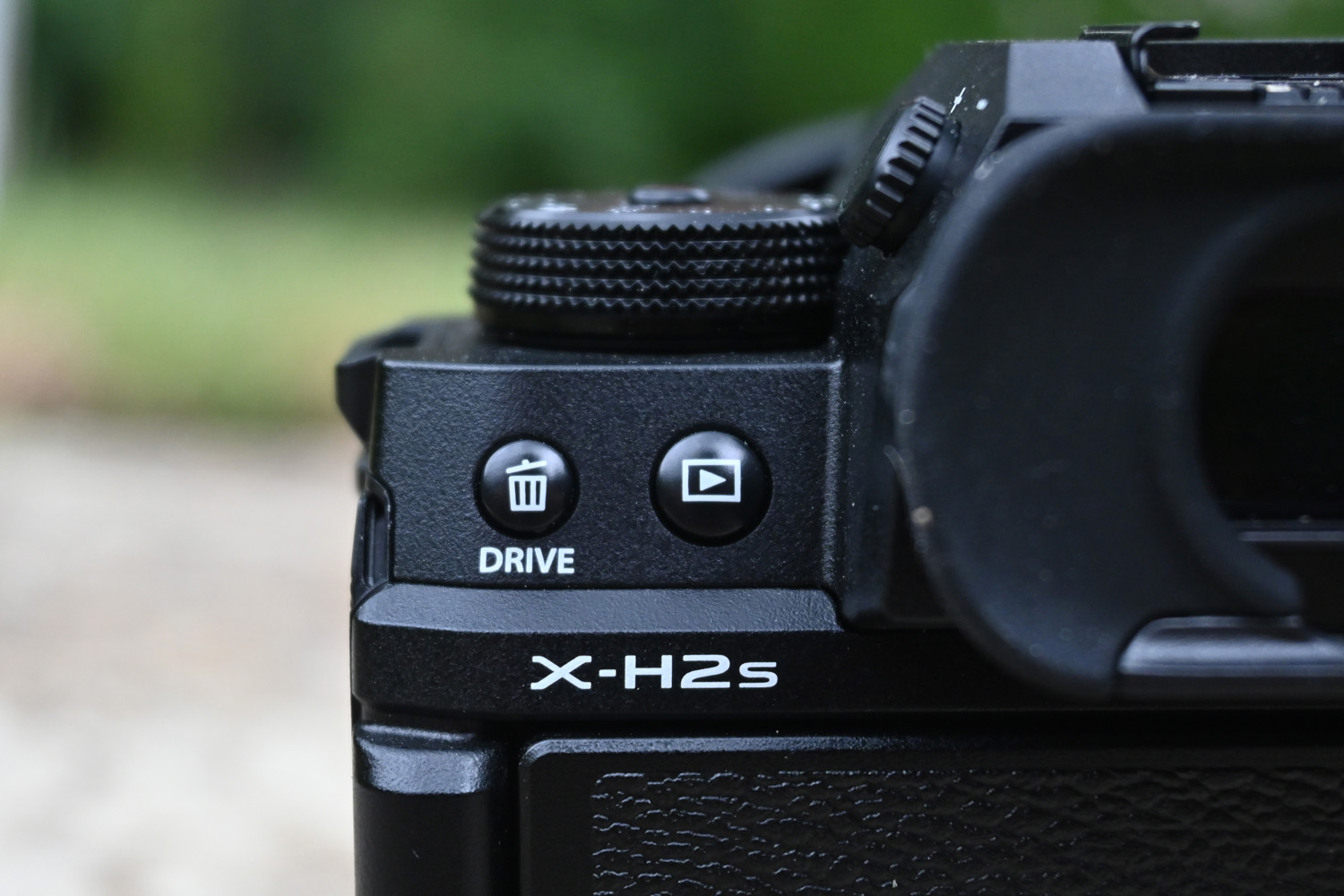 Fuji X-H2S digital system camera close-up on logo