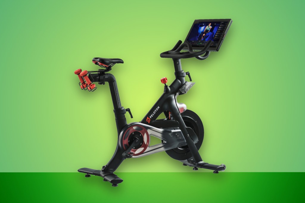 Peloton smart bike against green background