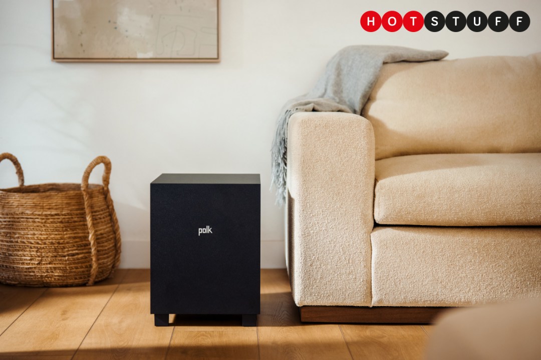 Polk's new Monitor XT10 subwoofer next to a beige sofa