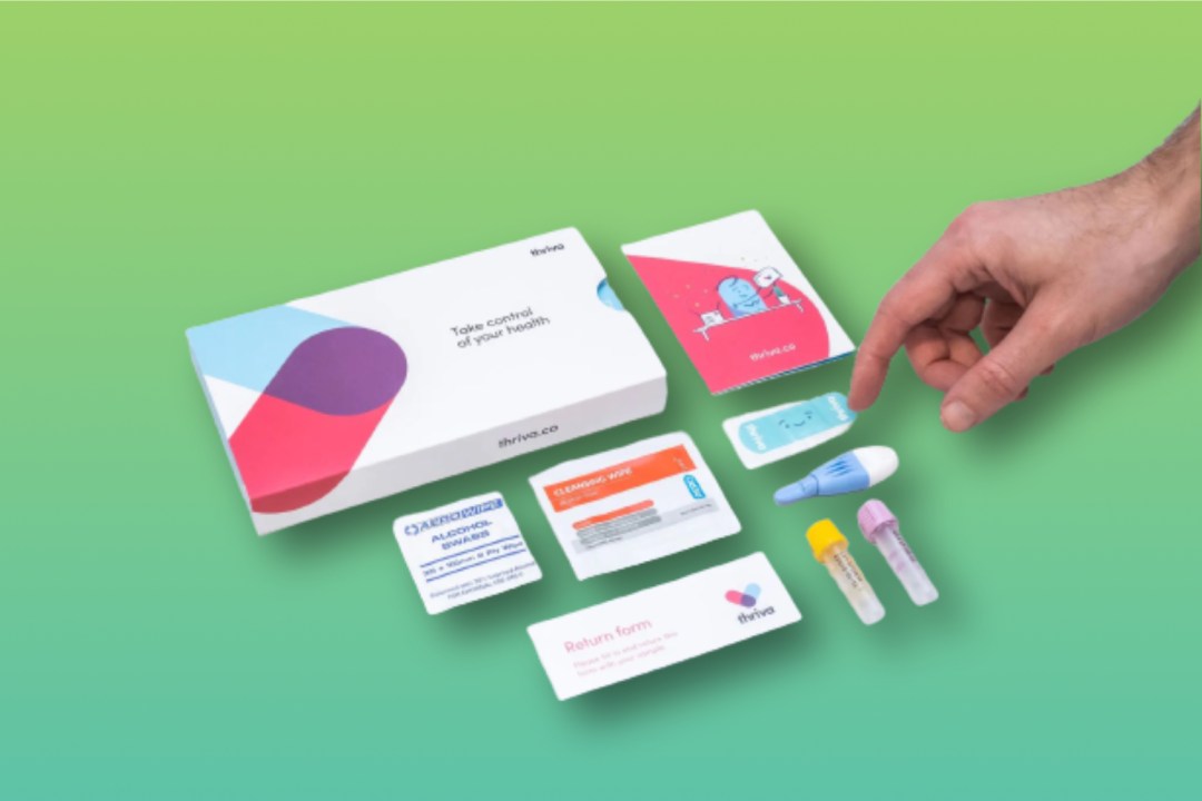 Thriva blood test kit on green background