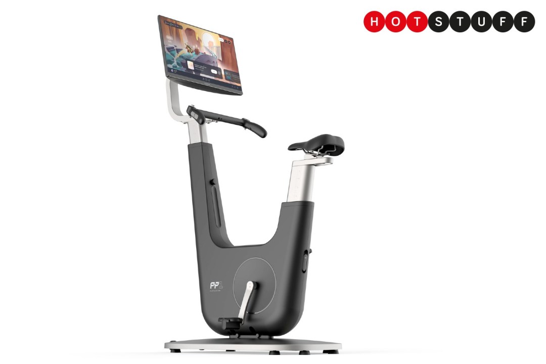 A PlayPulse One exercise bike, with screen mounted on the handlebars, on a white background.