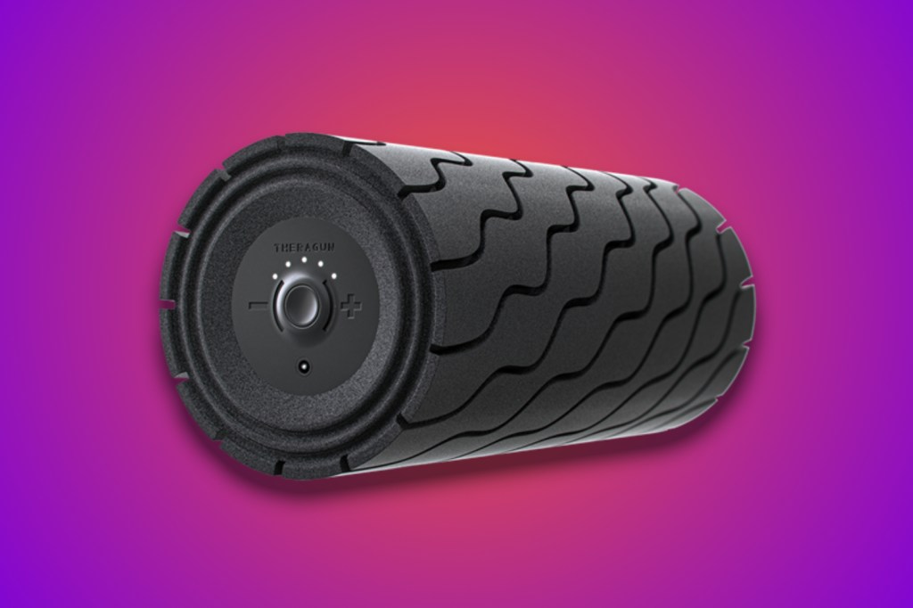 Theragun wave roller in front of purple background