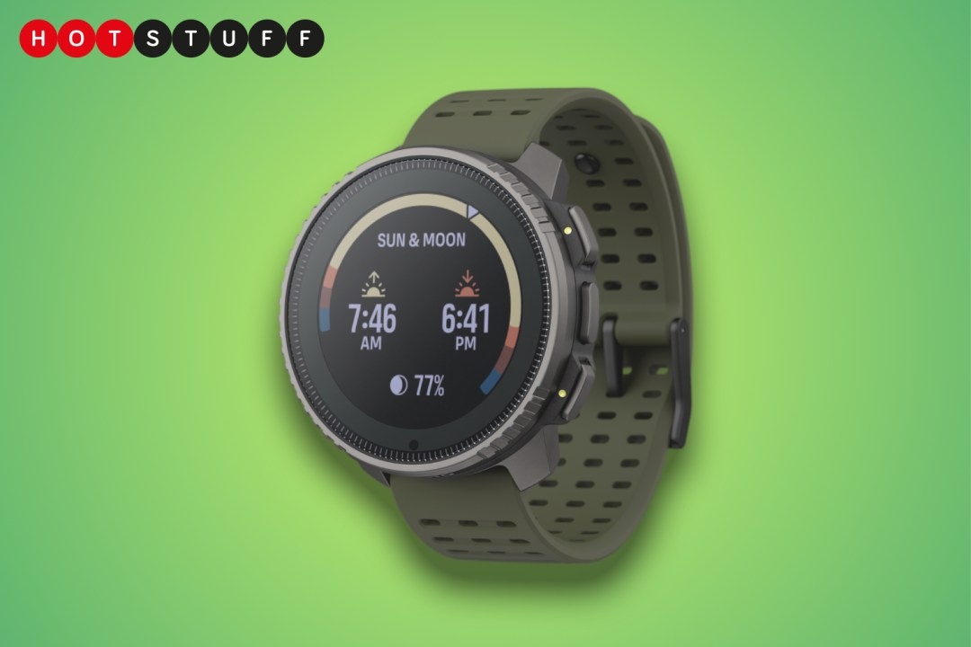 Suunto Vertical watch in front of green background