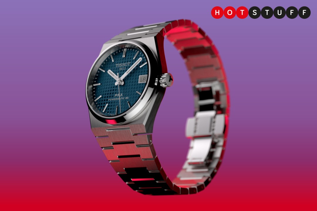 Tissot PRX 35mm automatic on a purple and red gradient