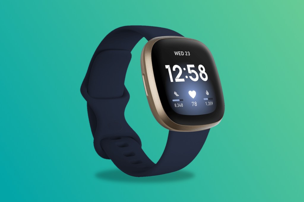 Fitbit Versa 3 on green/blue background