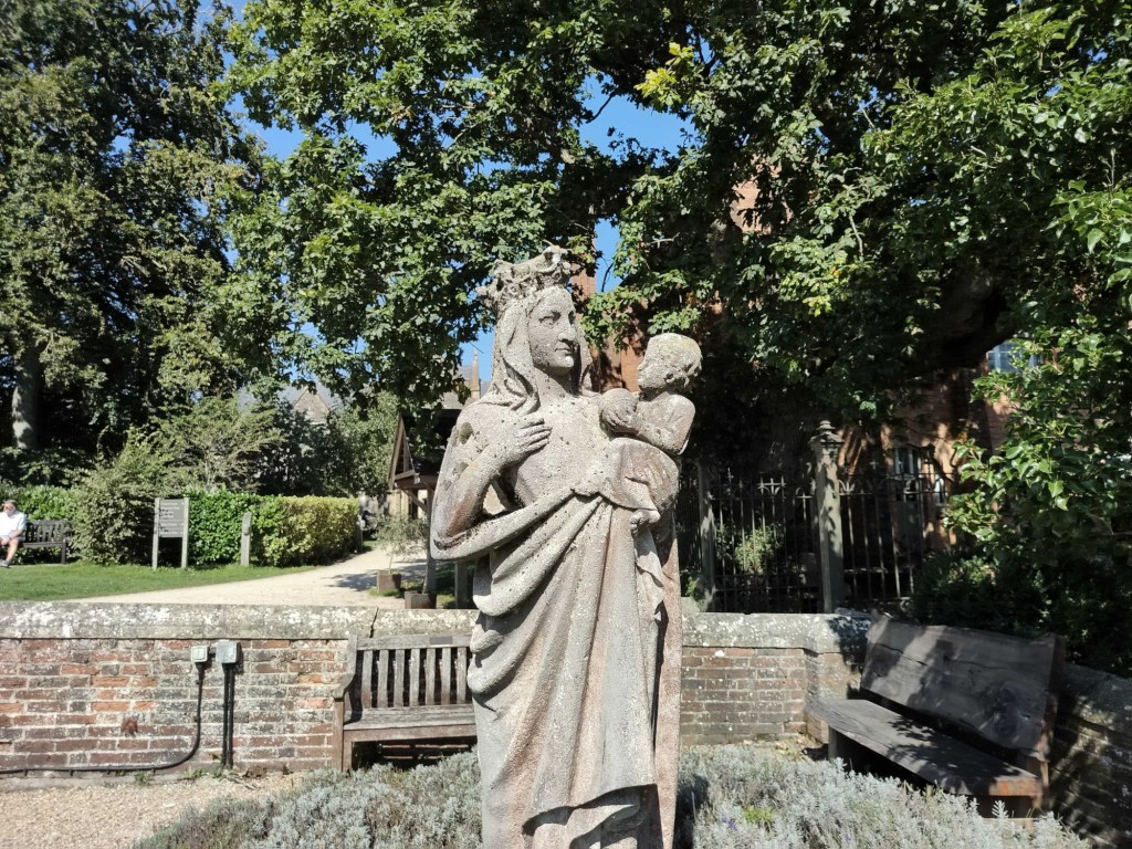 Statue of a woman holding a baby