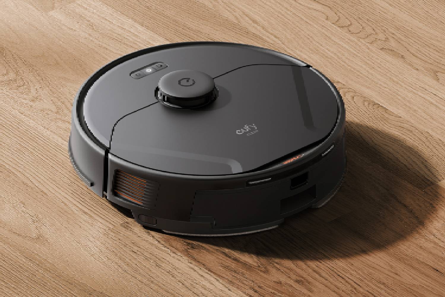 A black Eufy X8 Pro robot vacuum cleaner on a wooden floor.