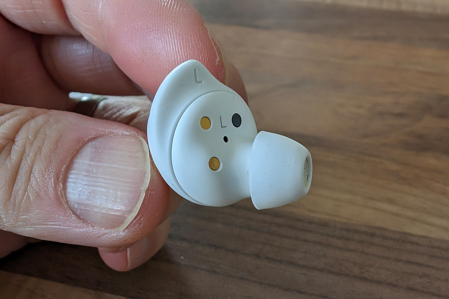Samsung Galaxy Buds FE review buds in hand front