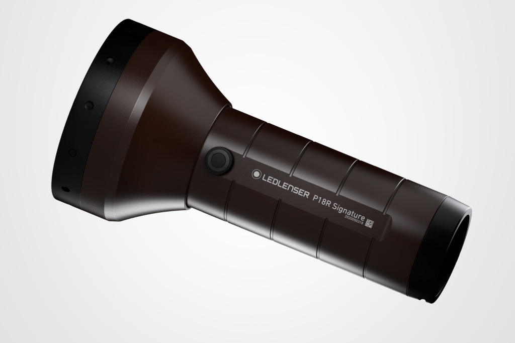 Best torches round-up: LED Lenser P18R flashlight pictured on a grey background with a drop shadow.