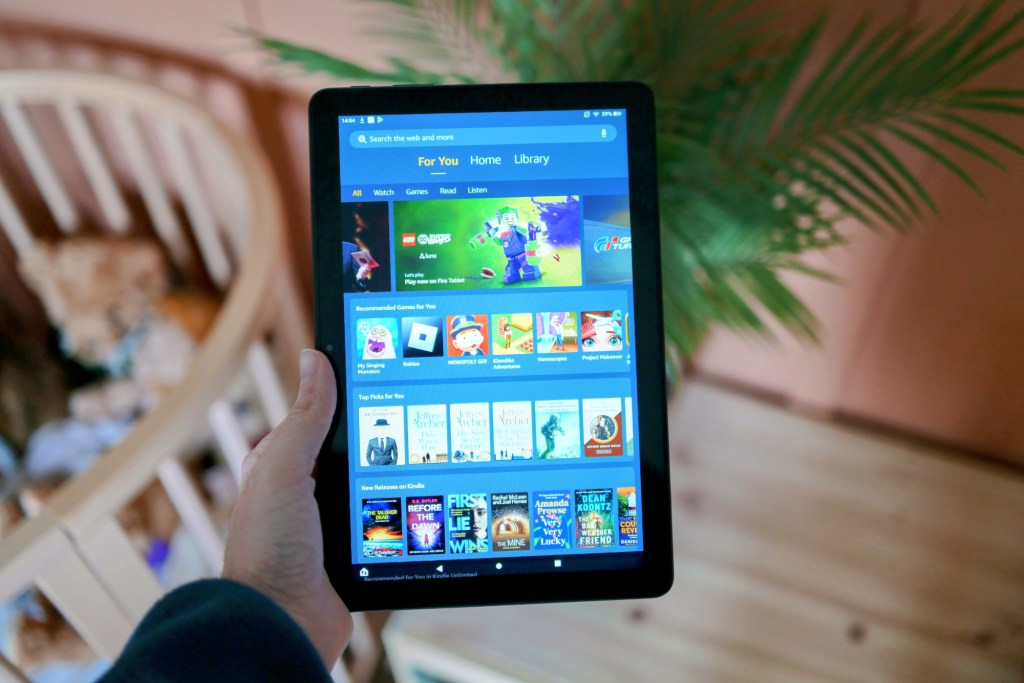 Amazon Fire HD 10 tablet held in hand