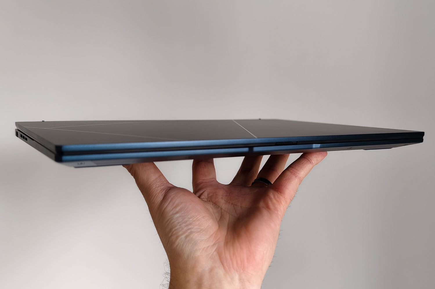 Asus Zenbook 14 OLED 2024 review in hand closed