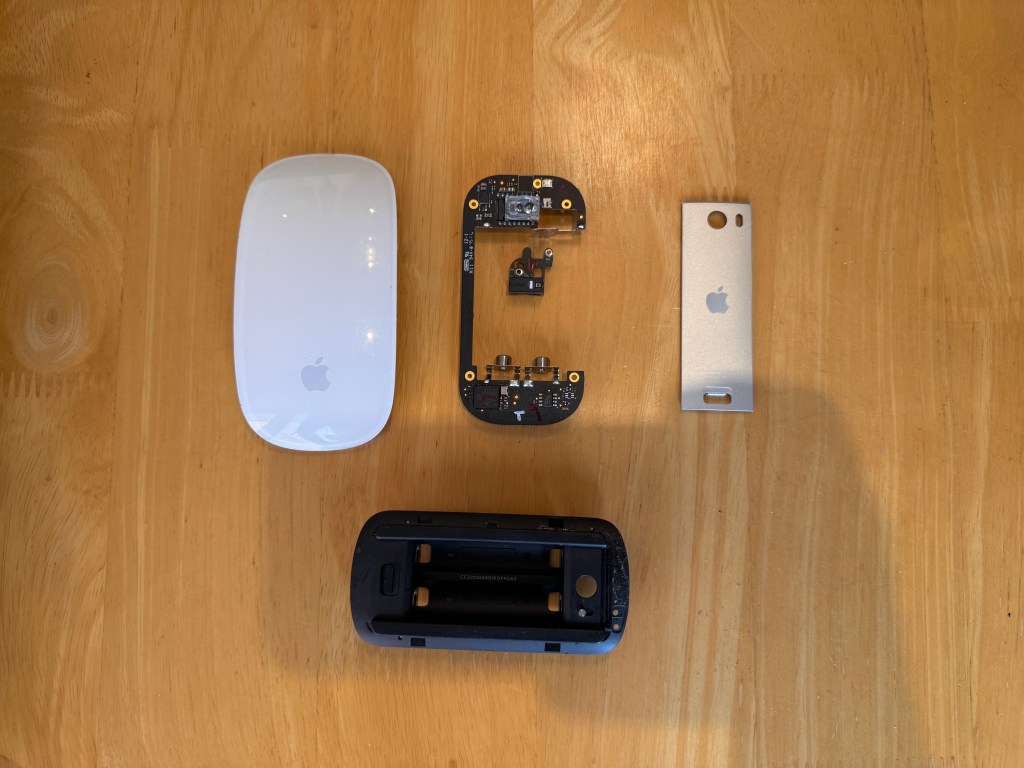 All the Magic Mouse pieces taken apart