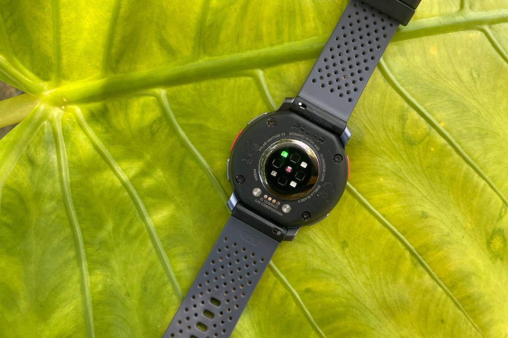 Polar Vantage V3 sports watch on a leaf