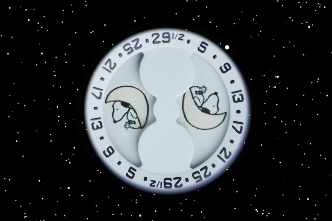 Close up of Snoopy MoonSwatch Moonphase complication