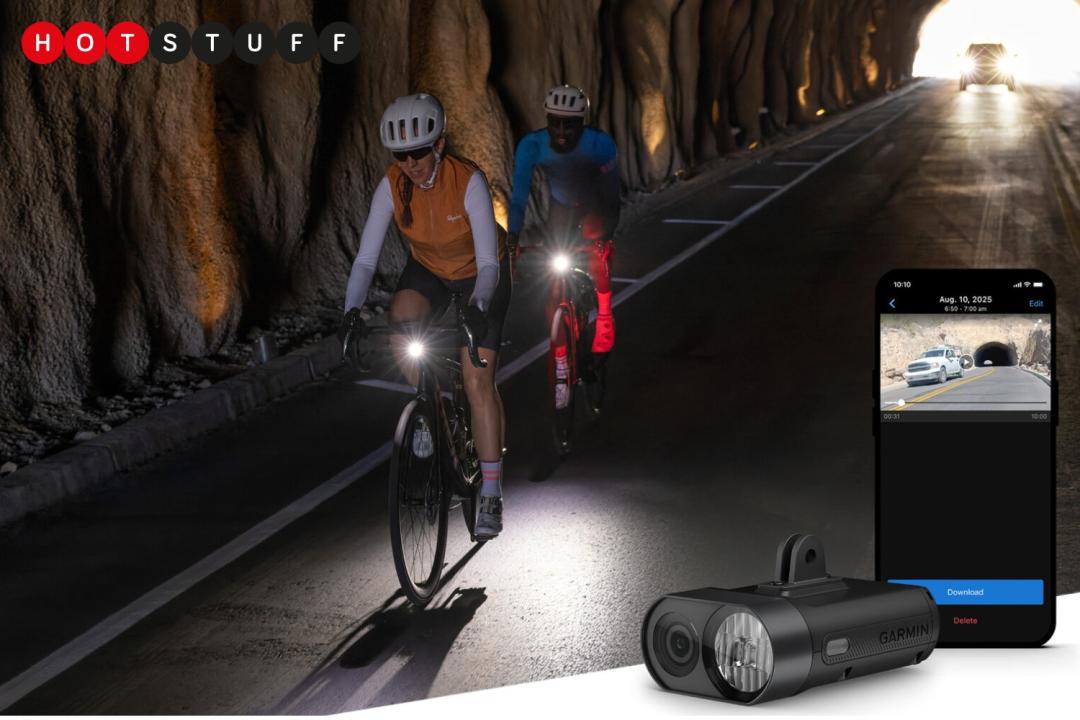 The image shows two cyclists on a road through a tunnel. A car is visible in the background. In the bottom-right corner is a Garmin Varia Vue camera/headlight and an Apple iPhone.