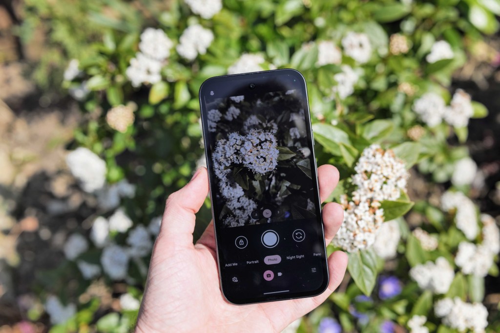 Google Pixel 9a in hand taking a picture