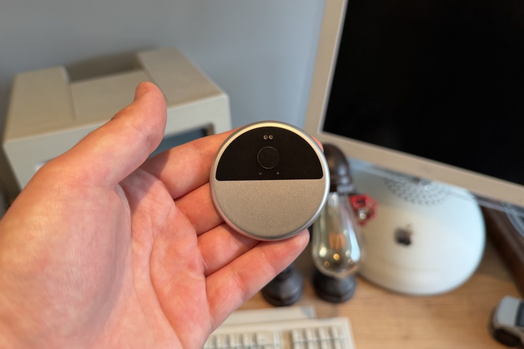 A close-up of the InnAIO Translator puck