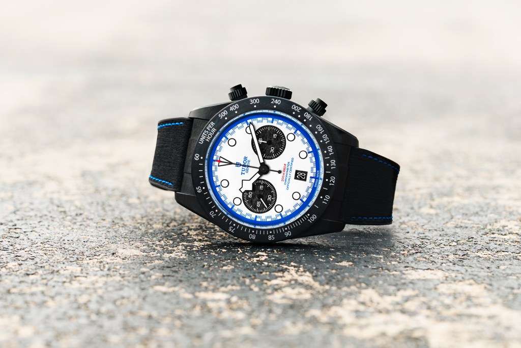 Tudor Black Bay Chrono Carbon25 on race track asphalt