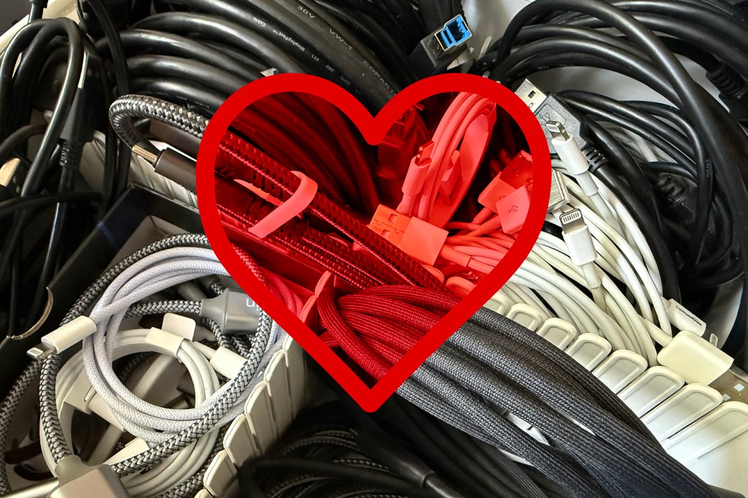 A drawer of organised cables, with a heart over the top