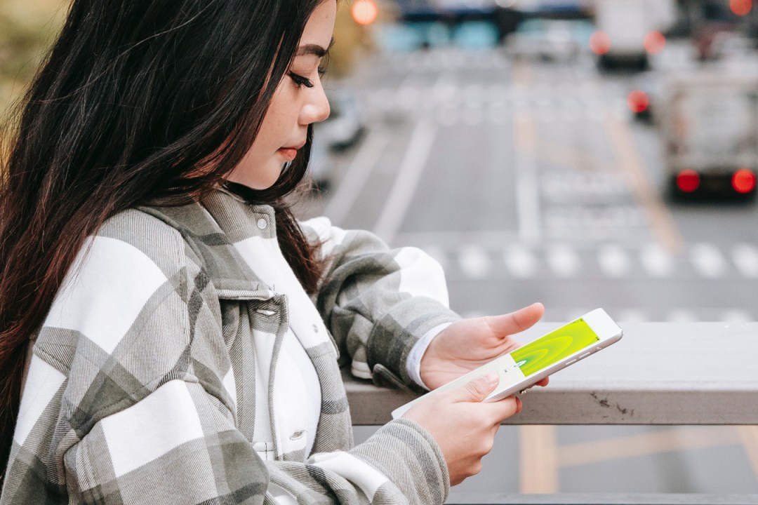 Girl using ExpressVPN on phone