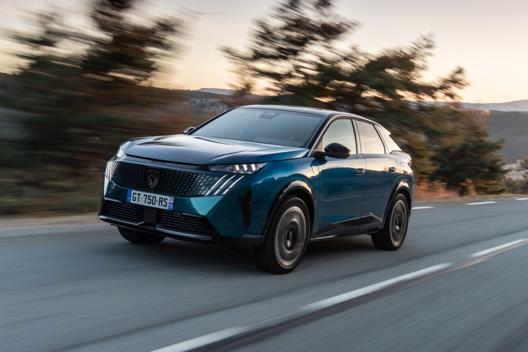Peugeot e-3008 review on road front