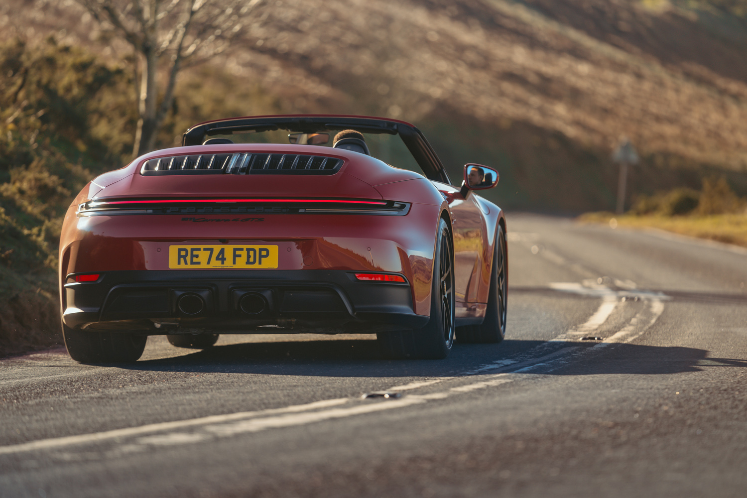 Porsche 911 GTS Cabriolet drive cornering rear