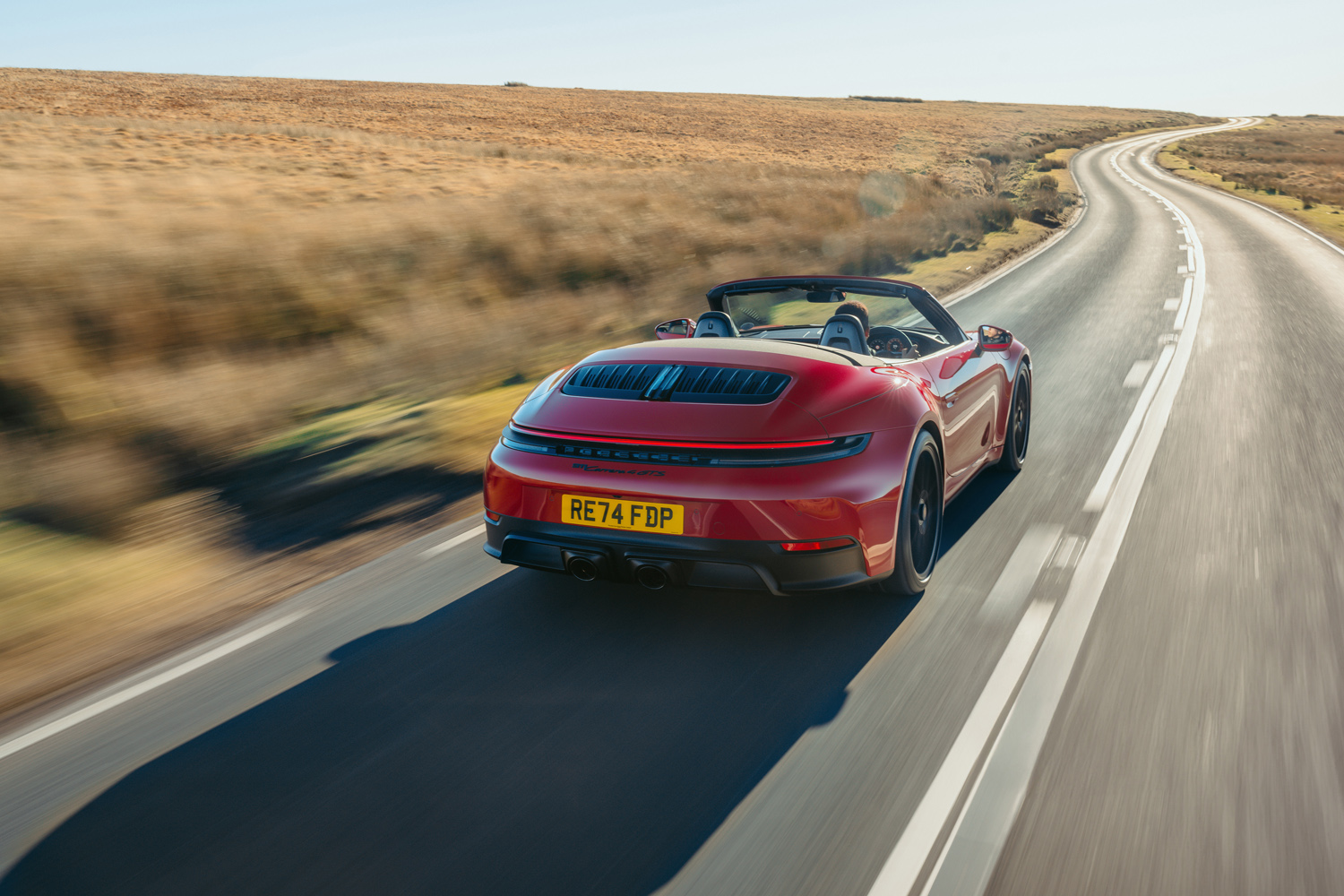 Porsche 911 GTS Cabriolet drive on road front