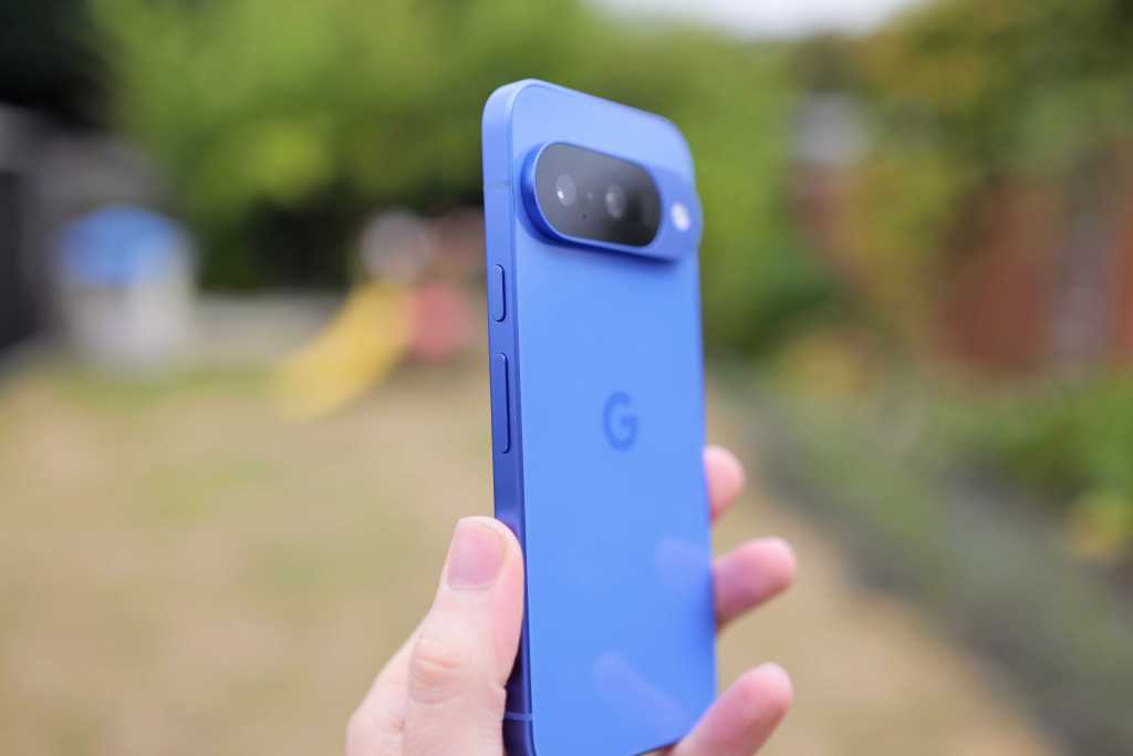 Google Pixel 10 in hand, side