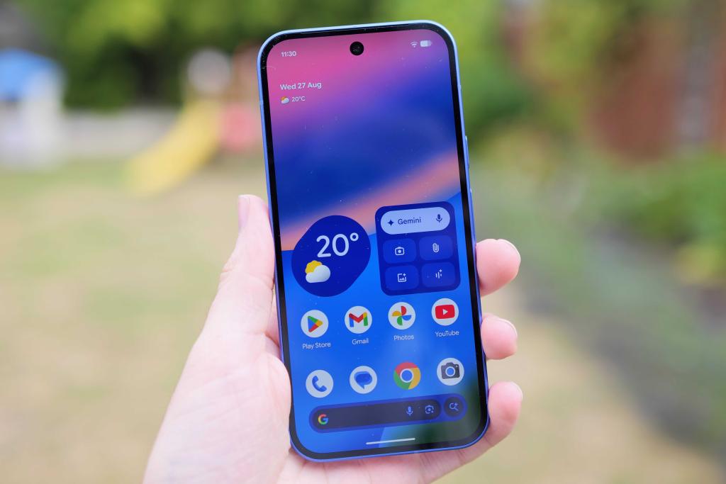 Google Pixel 10 in hand