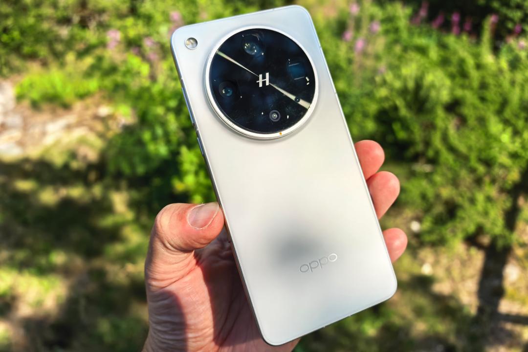 Oppo Find X8 Ultra review in hand rear outdoor