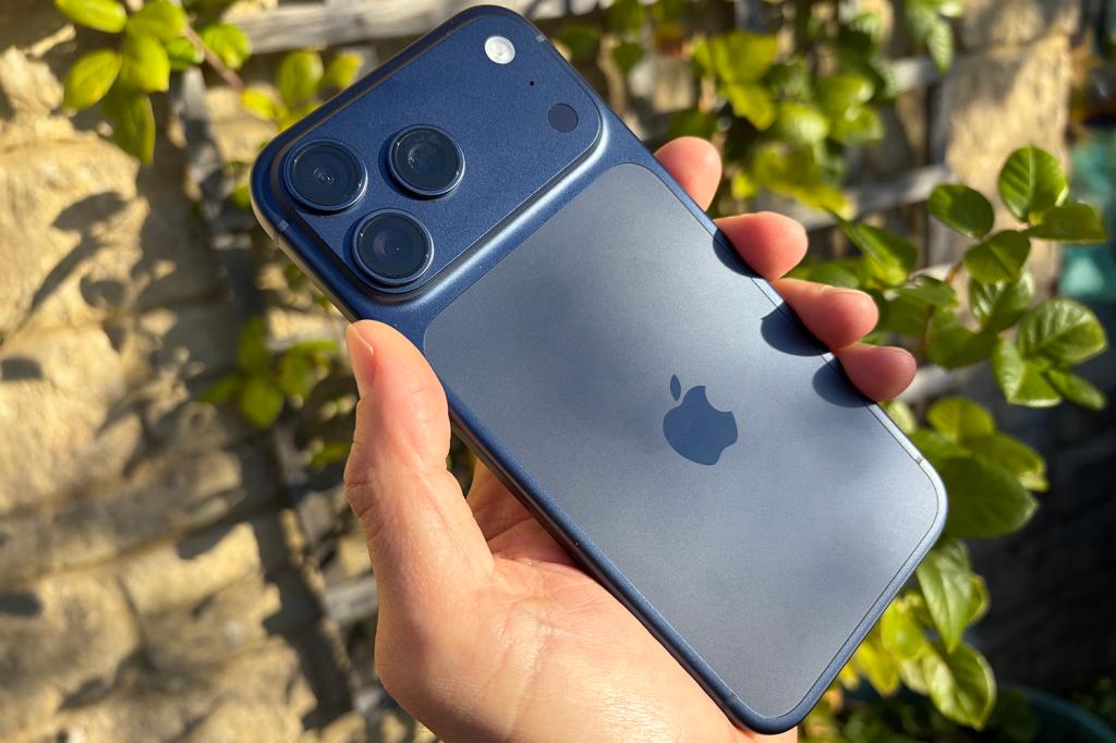 iPhone 17 Pro Max in hand