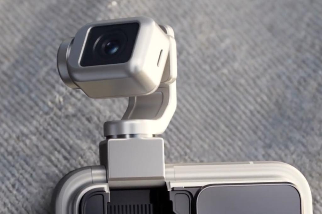 Honor Robot Phone shows robotic camera arm peaking out of shirt pocket