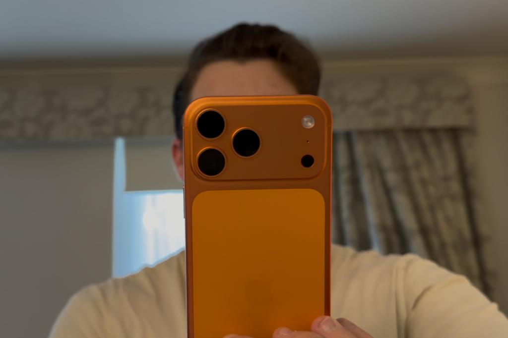 iPhone 17 Pro Max being held in front of person