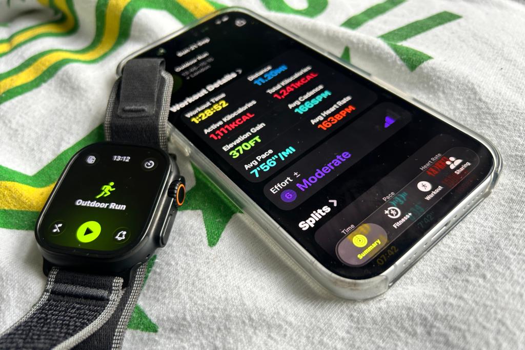 Apple Watch and iPhone on running shirt
