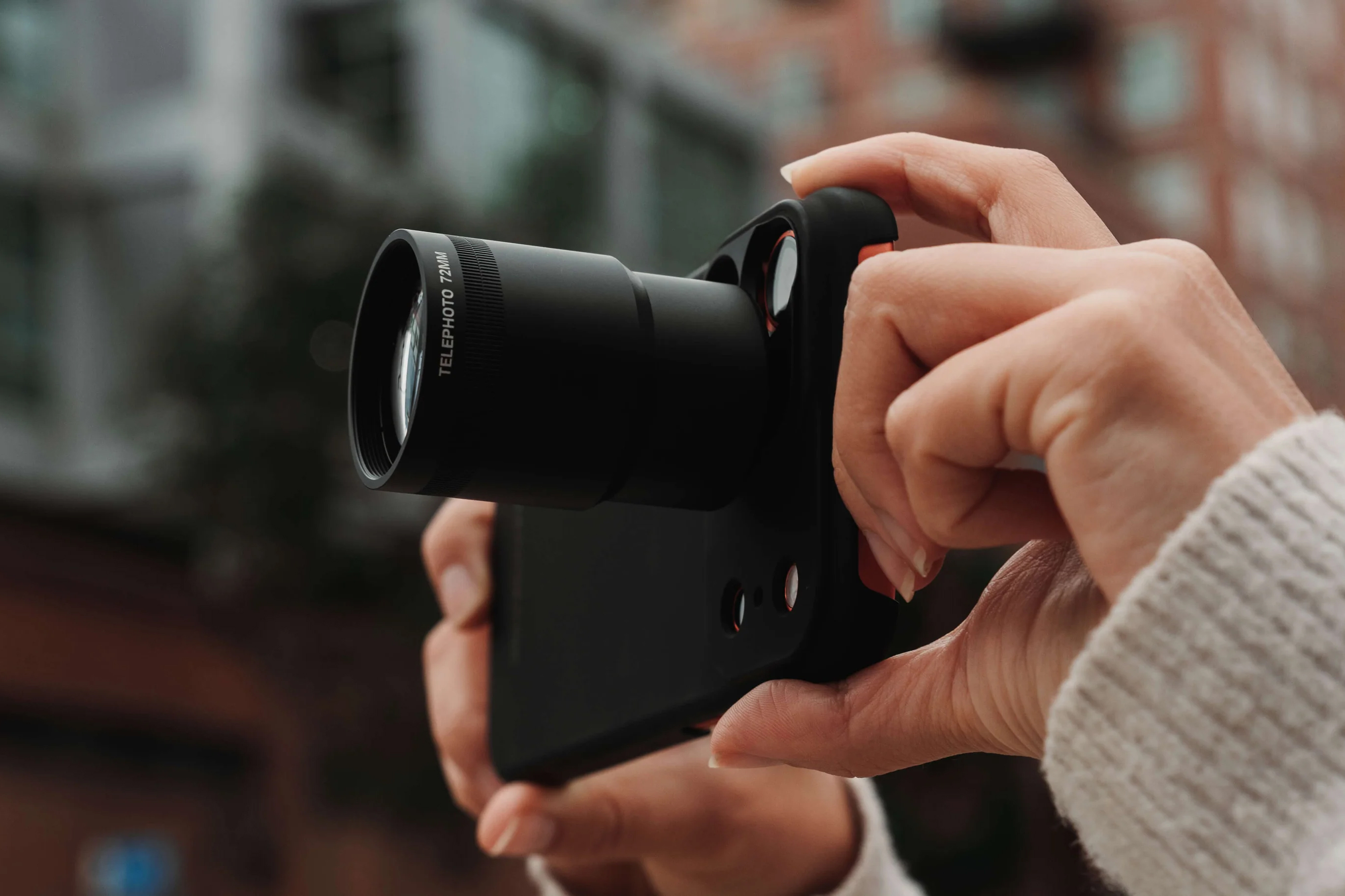 Yes, this huge iPhone zoom lens looks ridiculous. But it might actually be brilliant