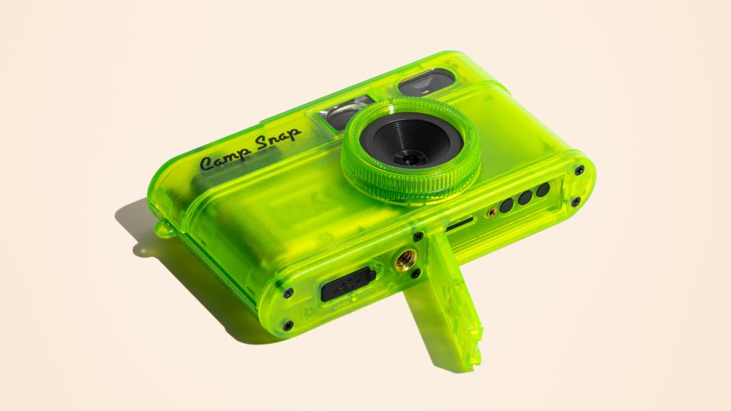 A green Camp Snap 2 camera