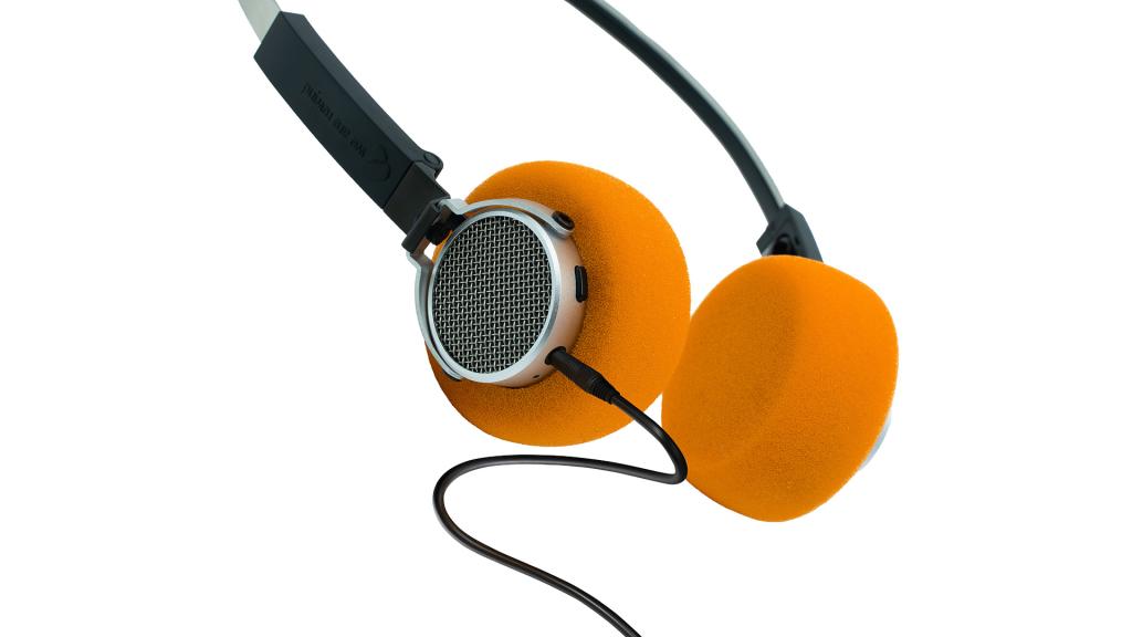 A pair of We Are Rewind EQ-002 Freddie headphones with orange ear cushions and cable attached